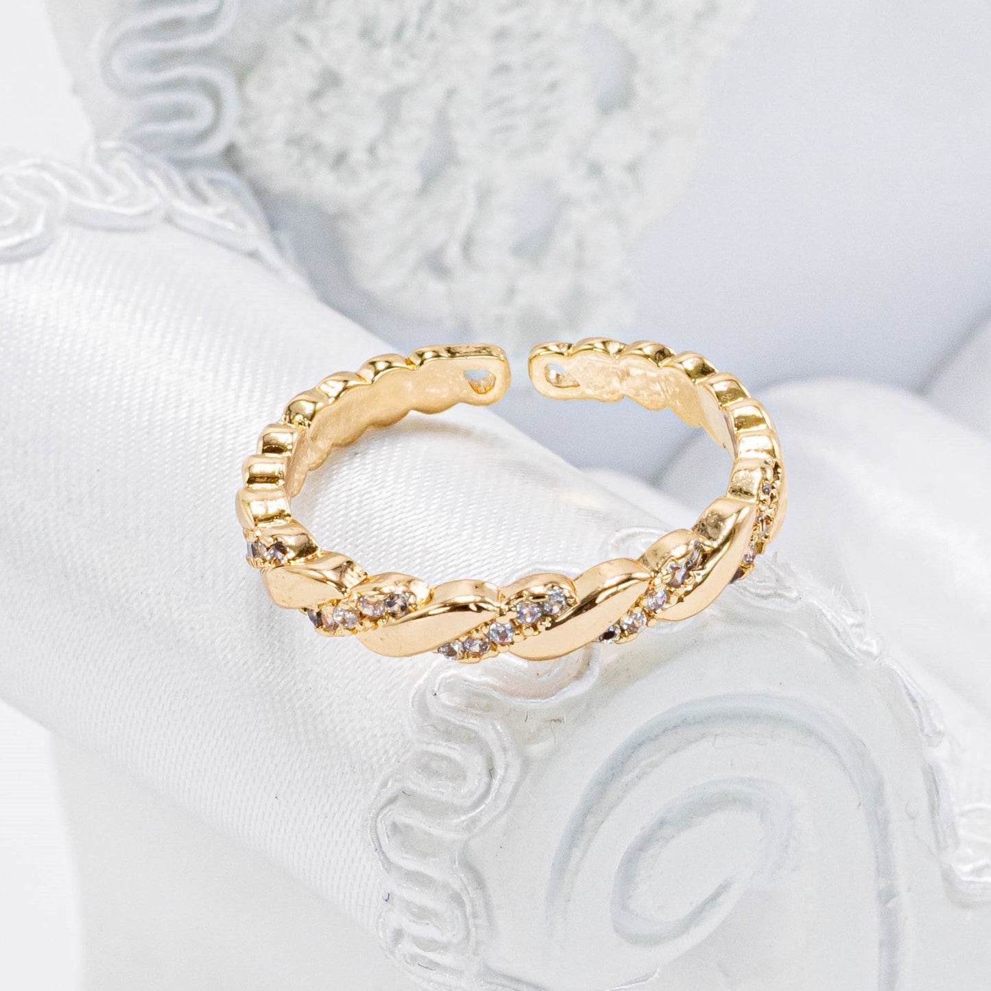 Anillo trenza microzircones