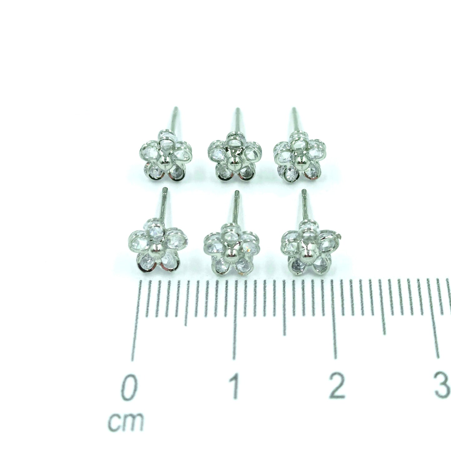 Topo trío flor zircón