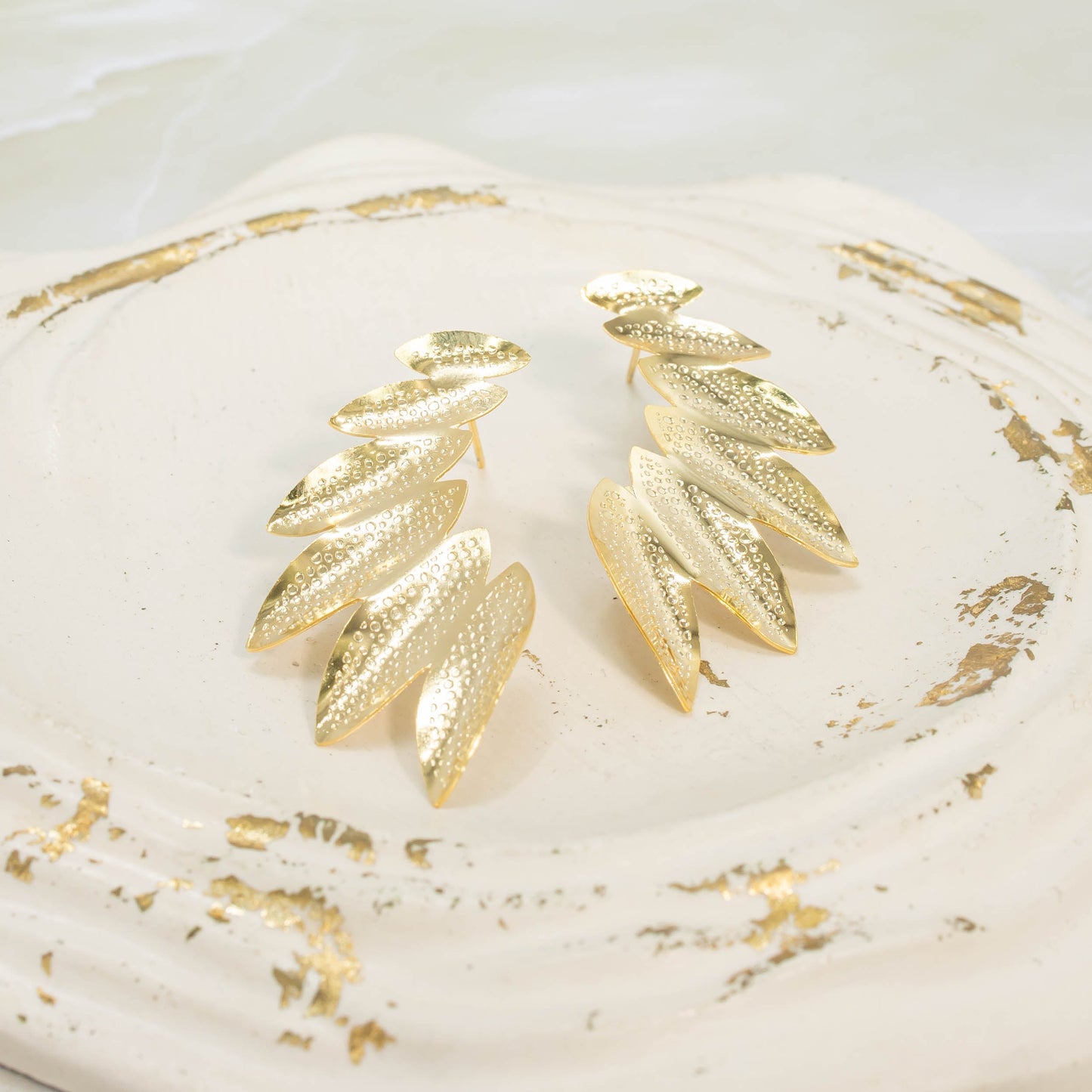 Arete bronce ala hojas