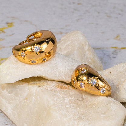 Candonga pequeña gota zircón