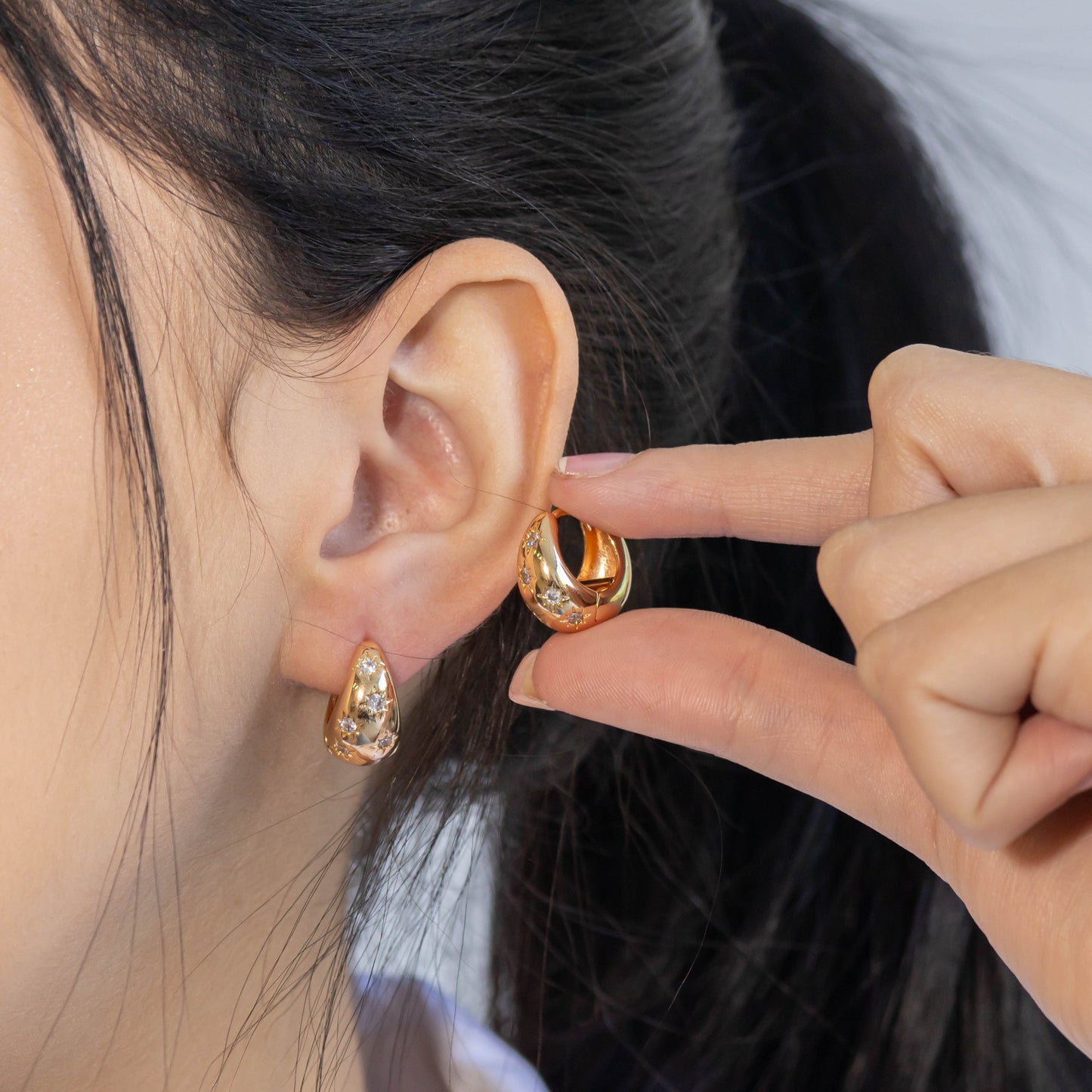 Candonga pequeña gota zircón