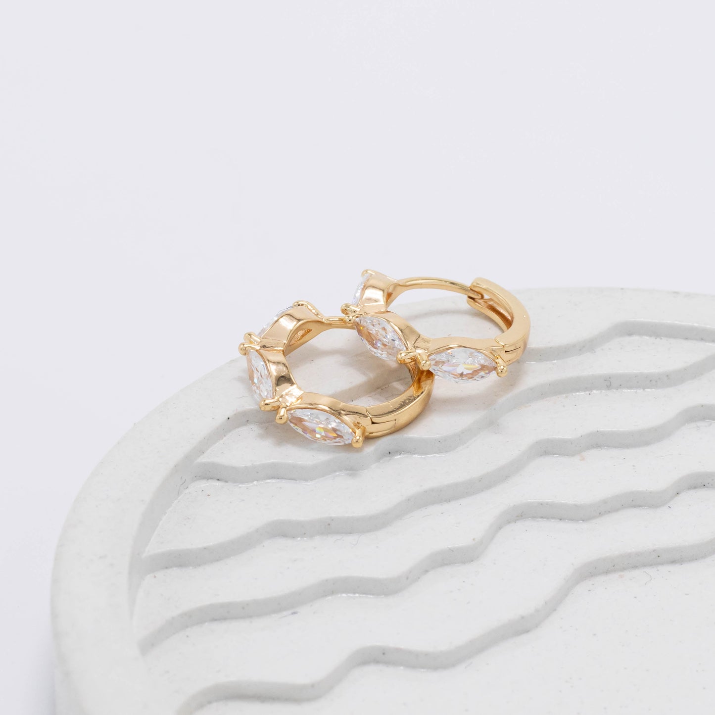 Cdga pequeña tres zircones