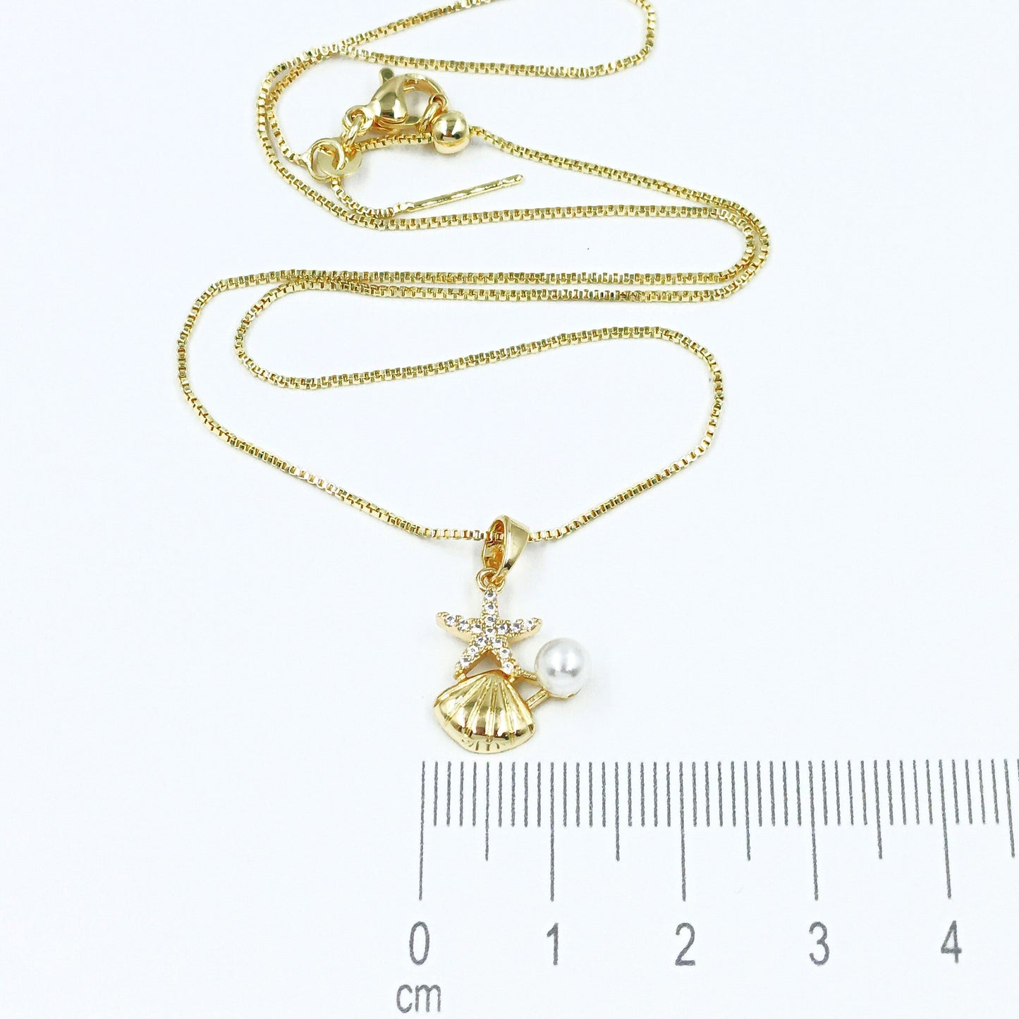 Collar rodio Estrella y concha de mar