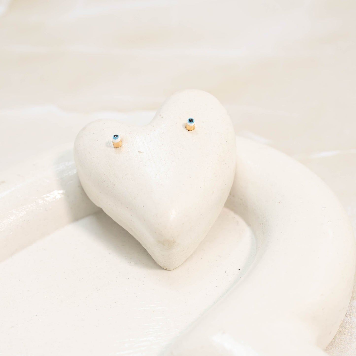 Topo ojo turco mini blanco